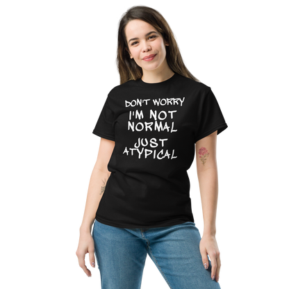 "Don't Worry I'm Not Normal Just Atypical" printed on a black unisex classic tee worn by a female