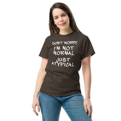 "Don't Worry I'm Not Normal Just Atypical" printed on a dark chocolate unisex classic tee worn by a female