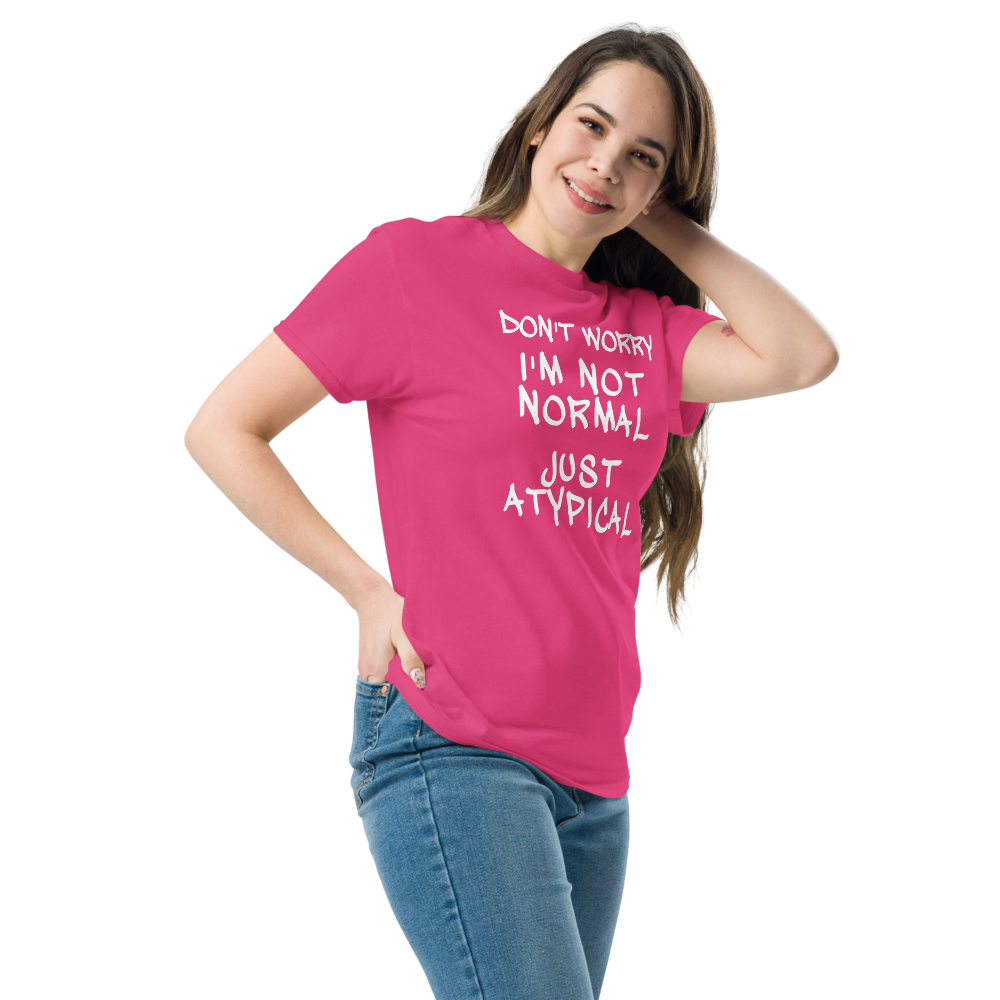 "Don't Worry I'm Not Normal Just Atypical" printed on a heliconia unisex classic tee worn by a female