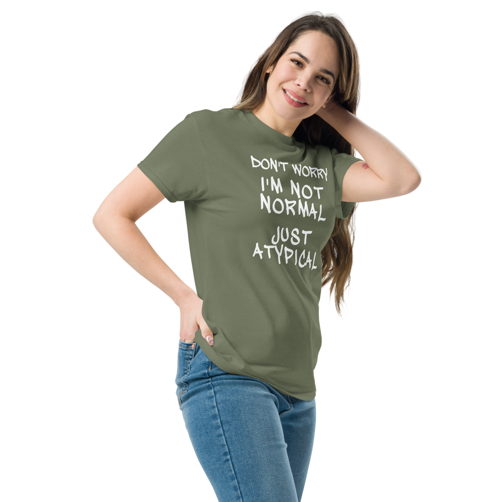 "Don't Worry I'm Not Normal Just Atypical" printed on a military green unisex classic tee worn by a female