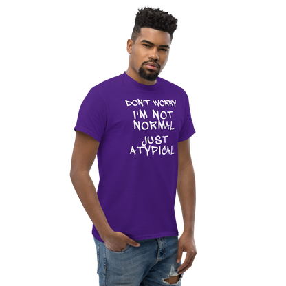 "Don't Worry I'm Not Normal Just Atypical" printed on a purple unisex classic tee worn by a male
