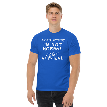 "Don't Worry I'm Not Normal Just Atypical" printed on a royal unisex classic tee worn by a male