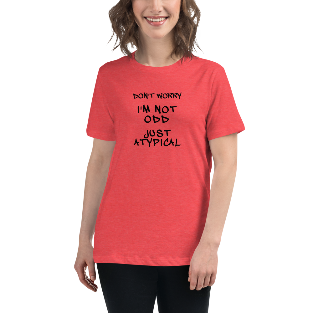 "Don't Worry I'm Not Odd Just Atypical" printed on a heather red women's relaxed t-shirt worn by a female