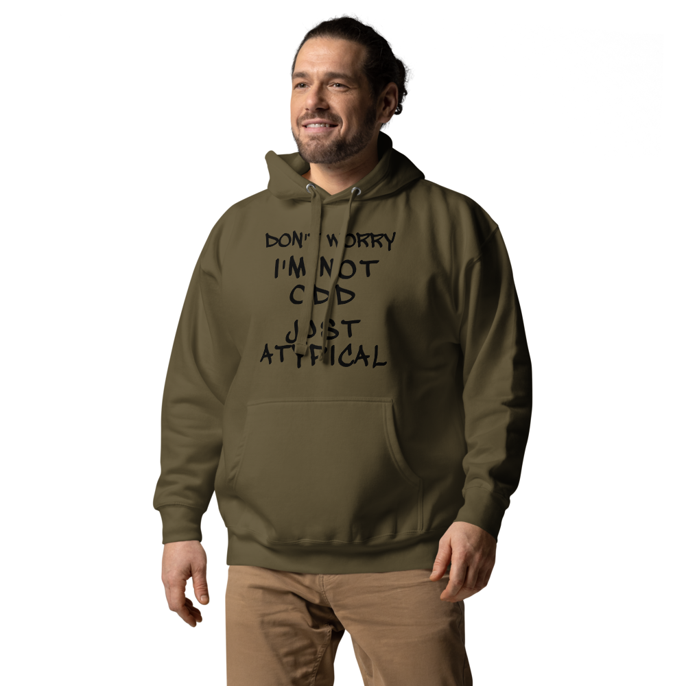 "Don't Worry I'm Not Odd Just Atypical" printed on a military green unisex hoodie worn by a male