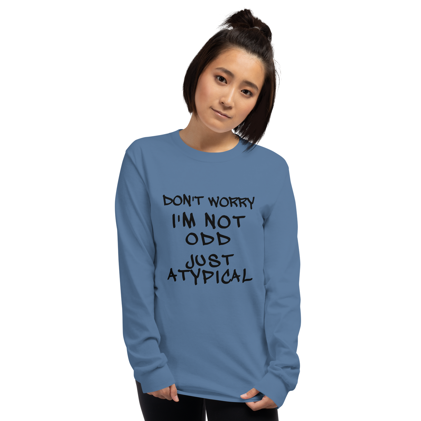 "Don't Worry I'm Not Odd Just Atypical" printed on a indigo blue men's long sleeve shirt worn by a female