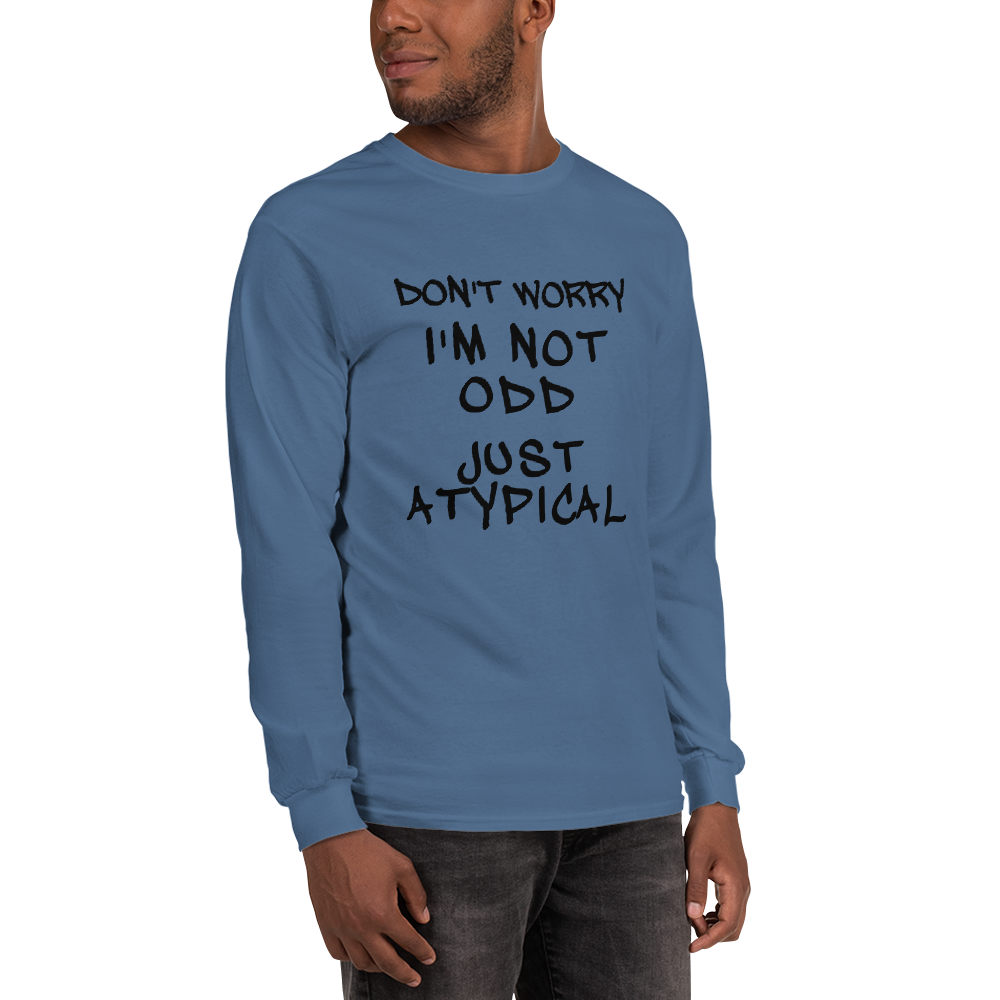 "Don't Worry I'm Not Odd Just Atypical" printed on a indigo blue men's long sleeve shirt worn by a male