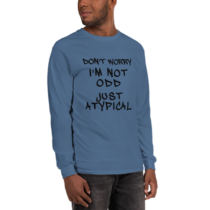 "Don't Worry I'm Not Odd Just Atypical" printed on a indigo blue men's long sleeve shirt worn by a male