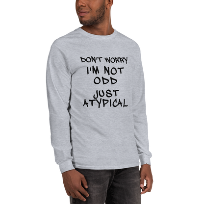 "Don't Worry I'm Not Odd Just Atypical" printed on a sport grey men's long sleeve shirt worn by a male