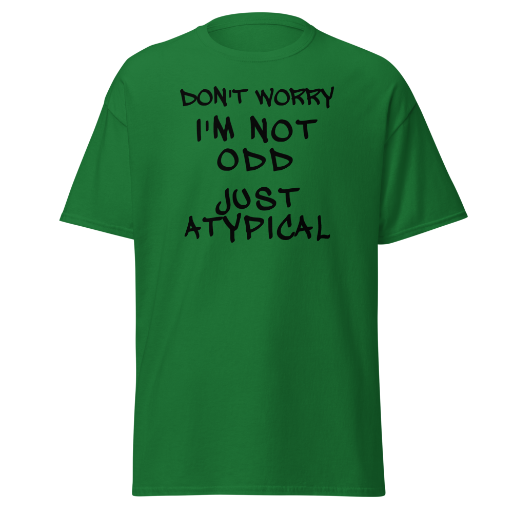 "Don't Worry I'm Not Odd Just Atypical" printed on a turf green on an invisible body