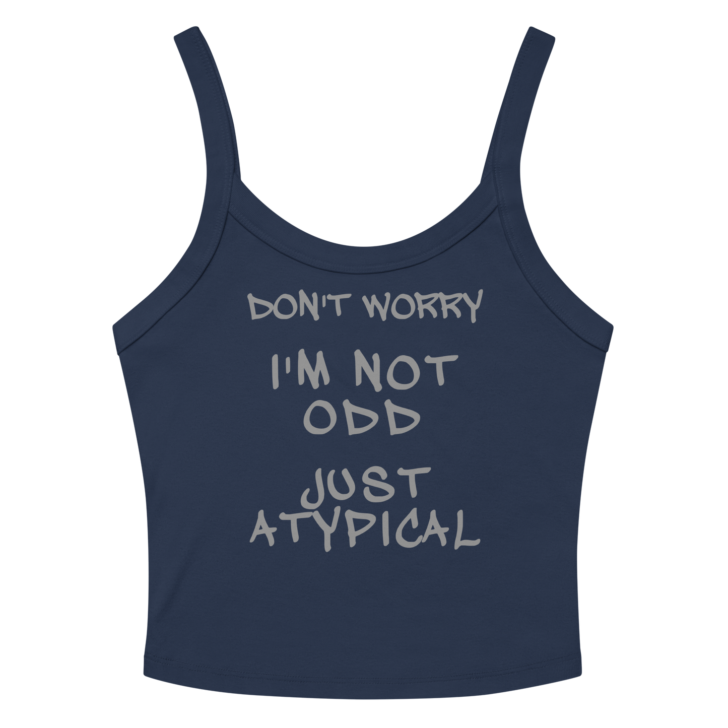 "Don't Worry I'm Not Odd Just Atypical" printed on a solid navy blend women's micro-rib tanktop laying on a flat surface amongst sunglasses and shorts