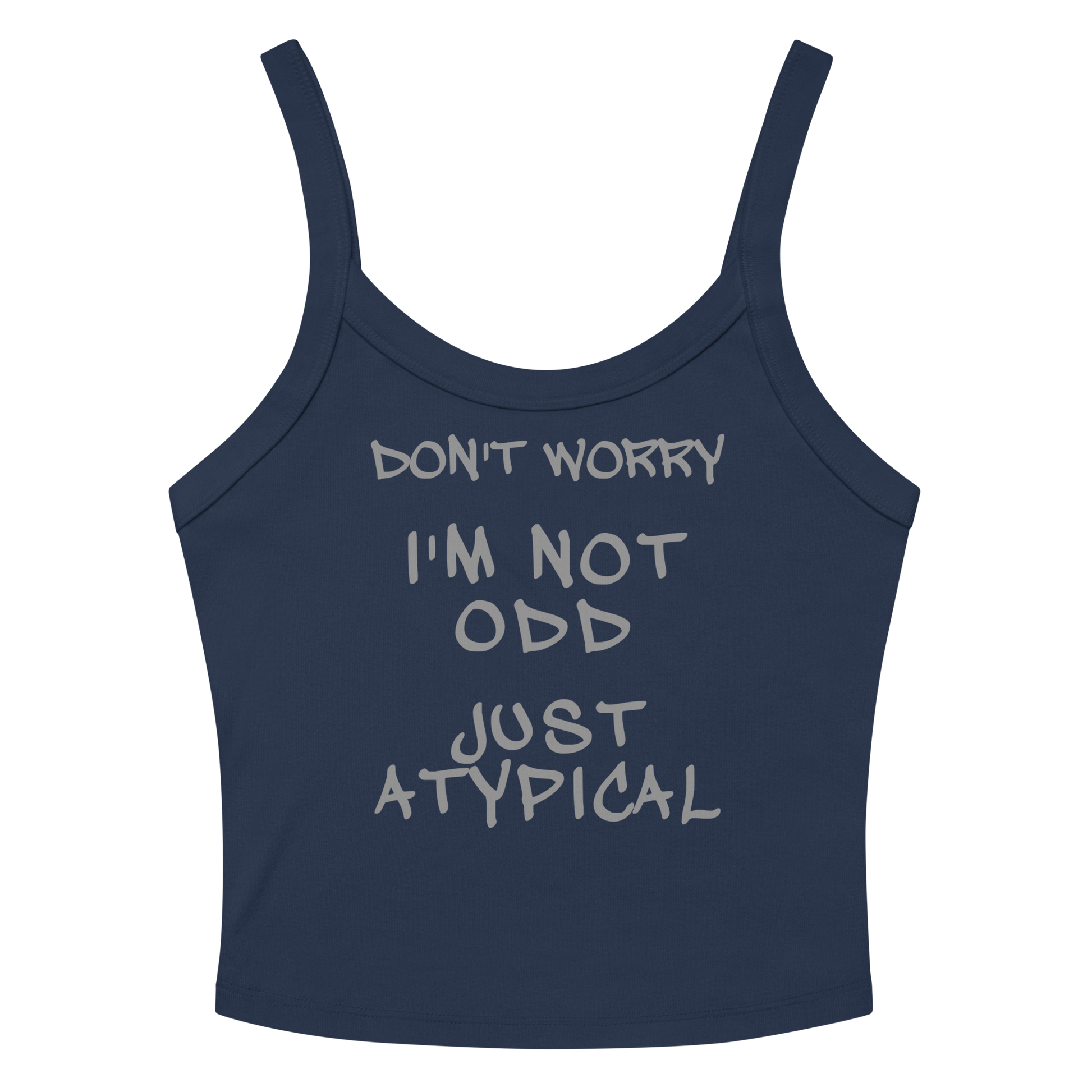 "Don't Worry I'm Not Odd Just Atypical" printed on a solid navy blend women's micro-rib tanktop laying on a flat surface amongst sunglasses and shorts