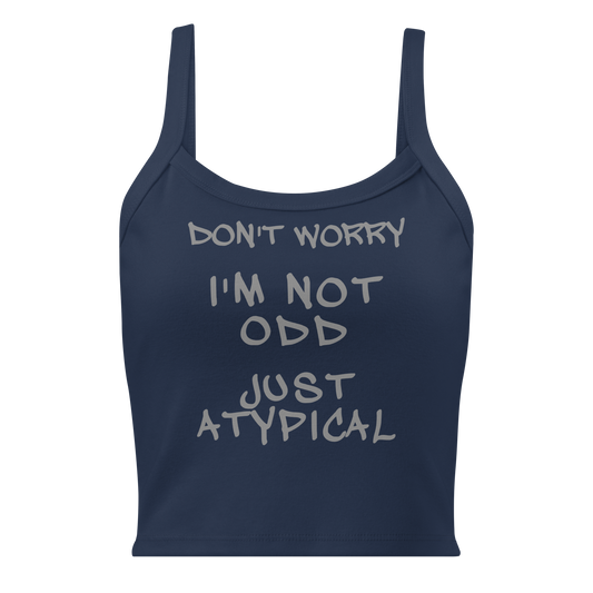"Don't Worry I'm Not Odd Just Atypical" printed on a solid navy blend women's micro-rib tanktop laying on a flat surface