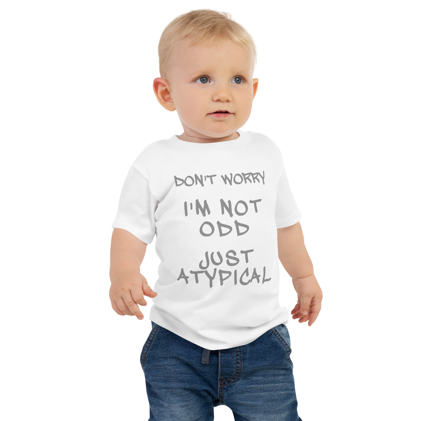 "Don't Worry I'm Not Odd Just Atypical" printed on a white baby jersey short sleeve tee worn by a male