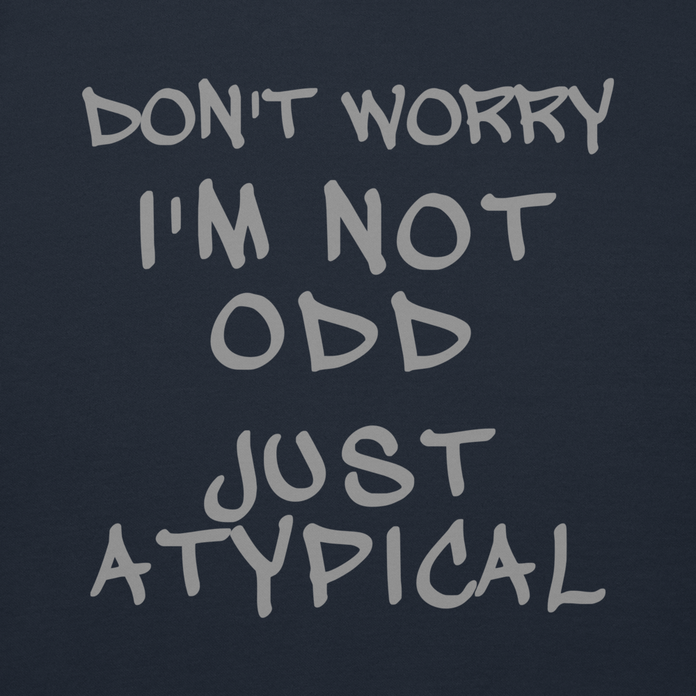 "Don't Worry I'm Not Odd Just Atypical" printed on a navy blazer background
