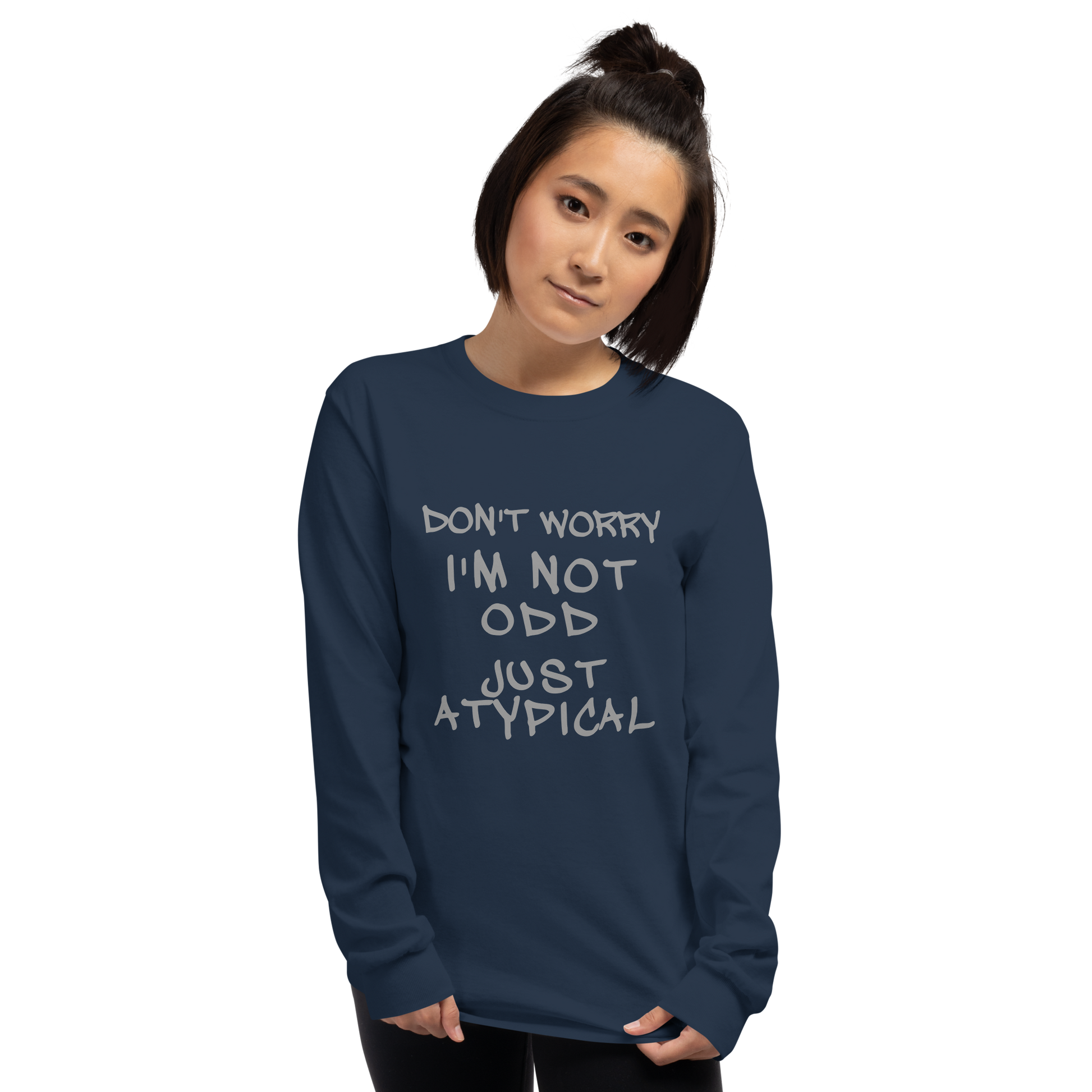 "Don't Worry I'm Not Odd Just Atypical" printed on a navy men's long sleeve shirt worn by a female