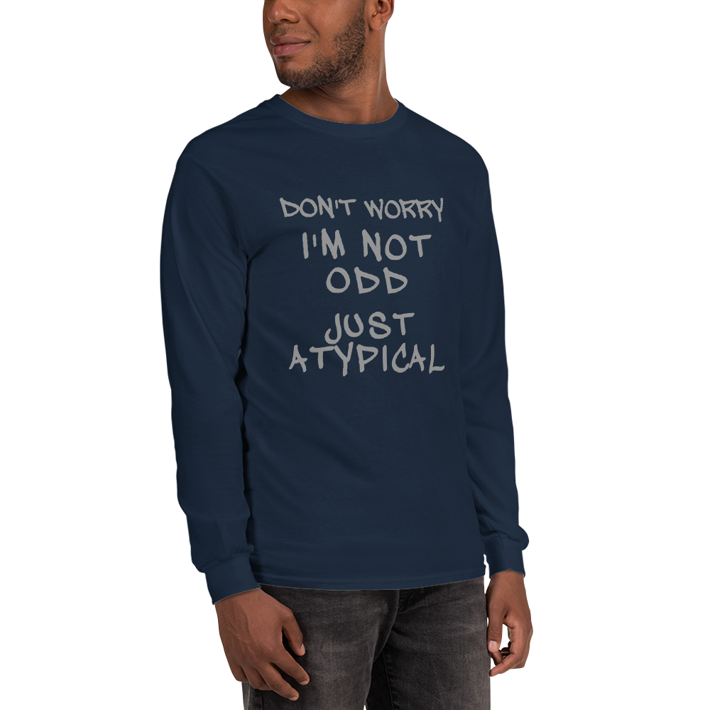 "Don't Worry I'm Not Odd Just Atypical" printed on a navy men's long sleeve shirt worn by a male