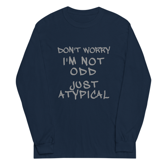 "Don't Worry I'm Not Odd Just Atypical" printed on a navy men's long sleeve shirt laying on a flat surface