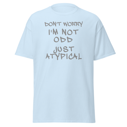 "Don't Worry I'm Not Odd Just Atypical" printed on a light blue on an invisible body