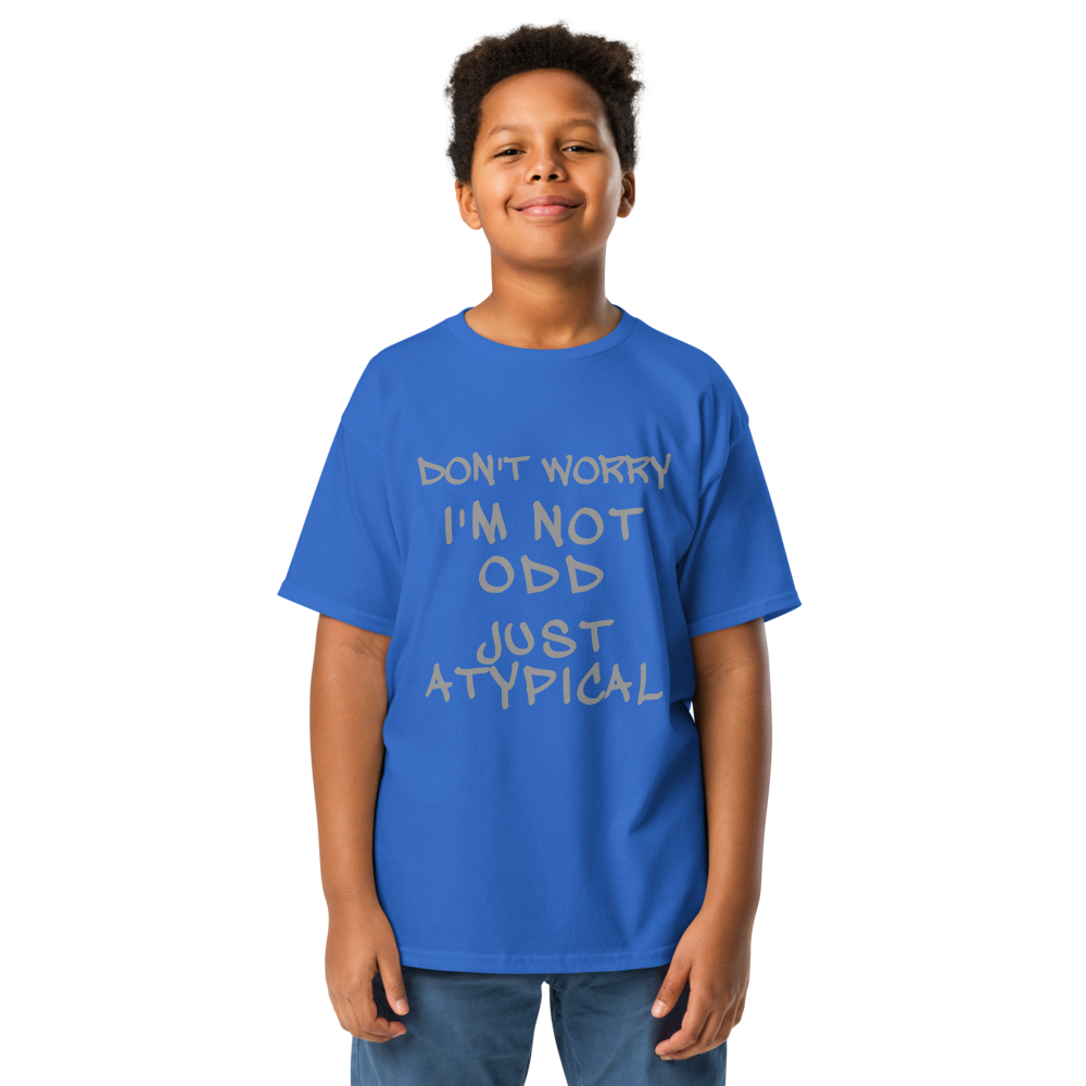 "Don't Worry I'm Not Odd Just Atypical" printed on a royal youth classic tee worn by a male