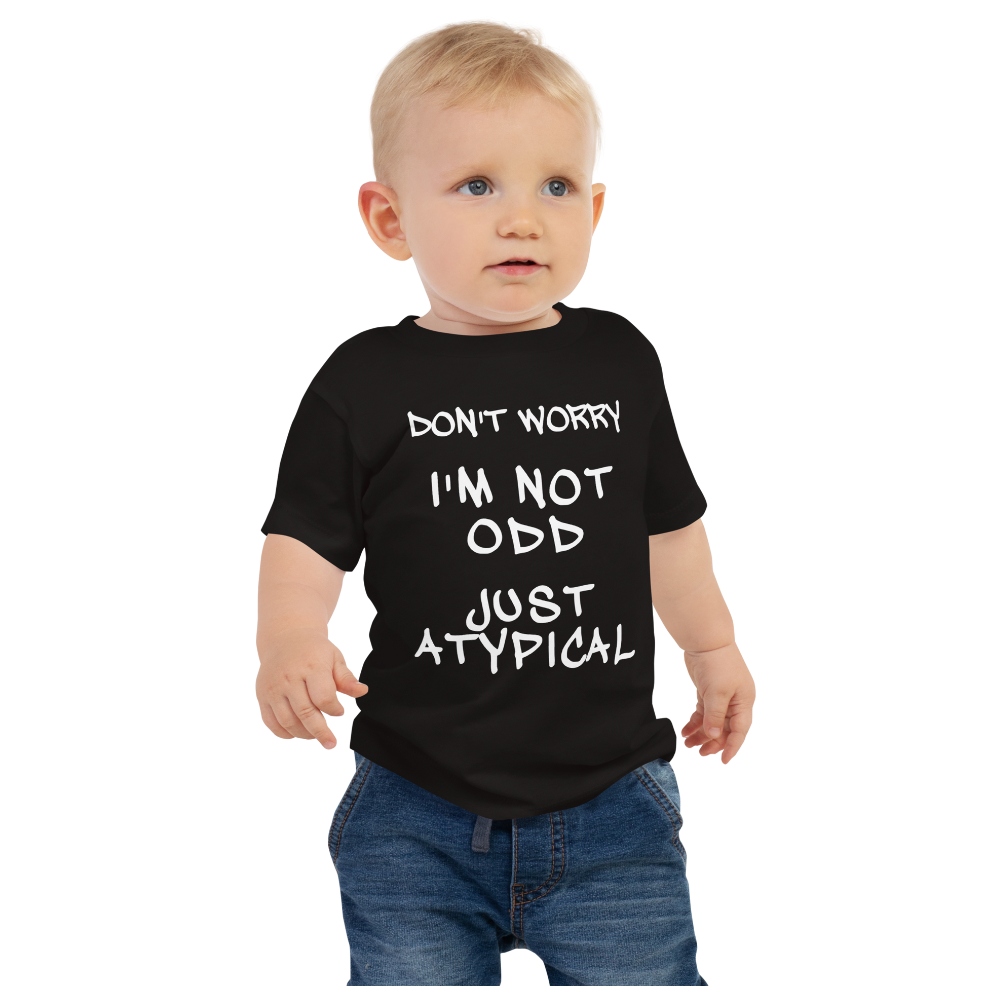 "Don't Worry I'm Not Odd Just Atypical" printed on a black baby jersey short sleeve tee worn by a male