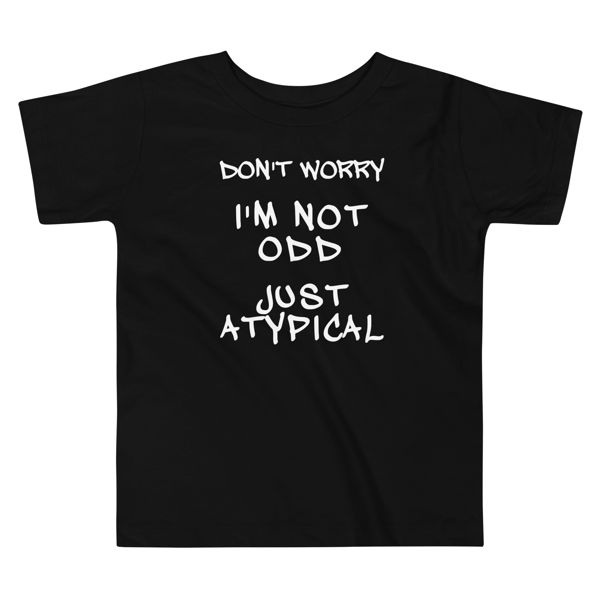 "Don't Worry I'm Not Odd Just Atypical" printed on a black toddler short sleeve tee laying on a flat surface