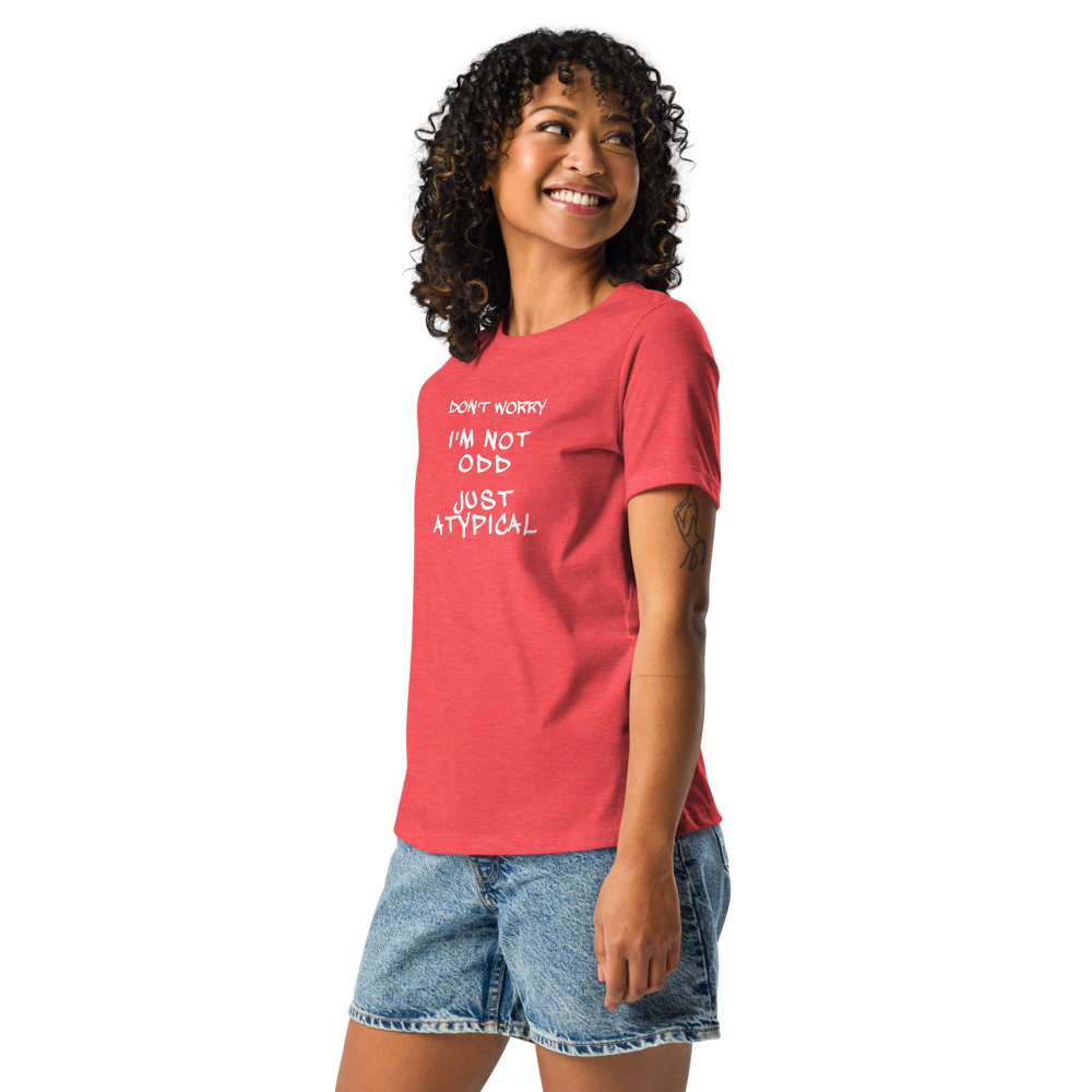 "Don't Worry I'm Not Odd Just Atypical" printed on a heather red women's relaxed t-shirt worn by a female