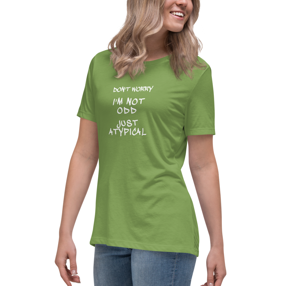 "Don't Worry I'm Not Odd Just Atypical" printed on a leaf women's relaxed t-shirt worn by a female