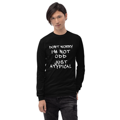 "Don't Worry I'm Not Odd Just Atypical" printed on a black men's long sleeve shirt worn by a male