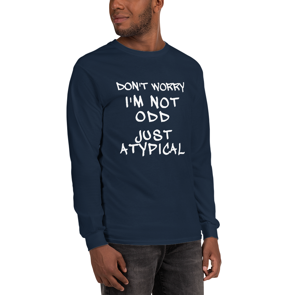"Don't Worry I'm Not Odd Just Atypical" printed on a navy men's long sleeve shirt worn by a male