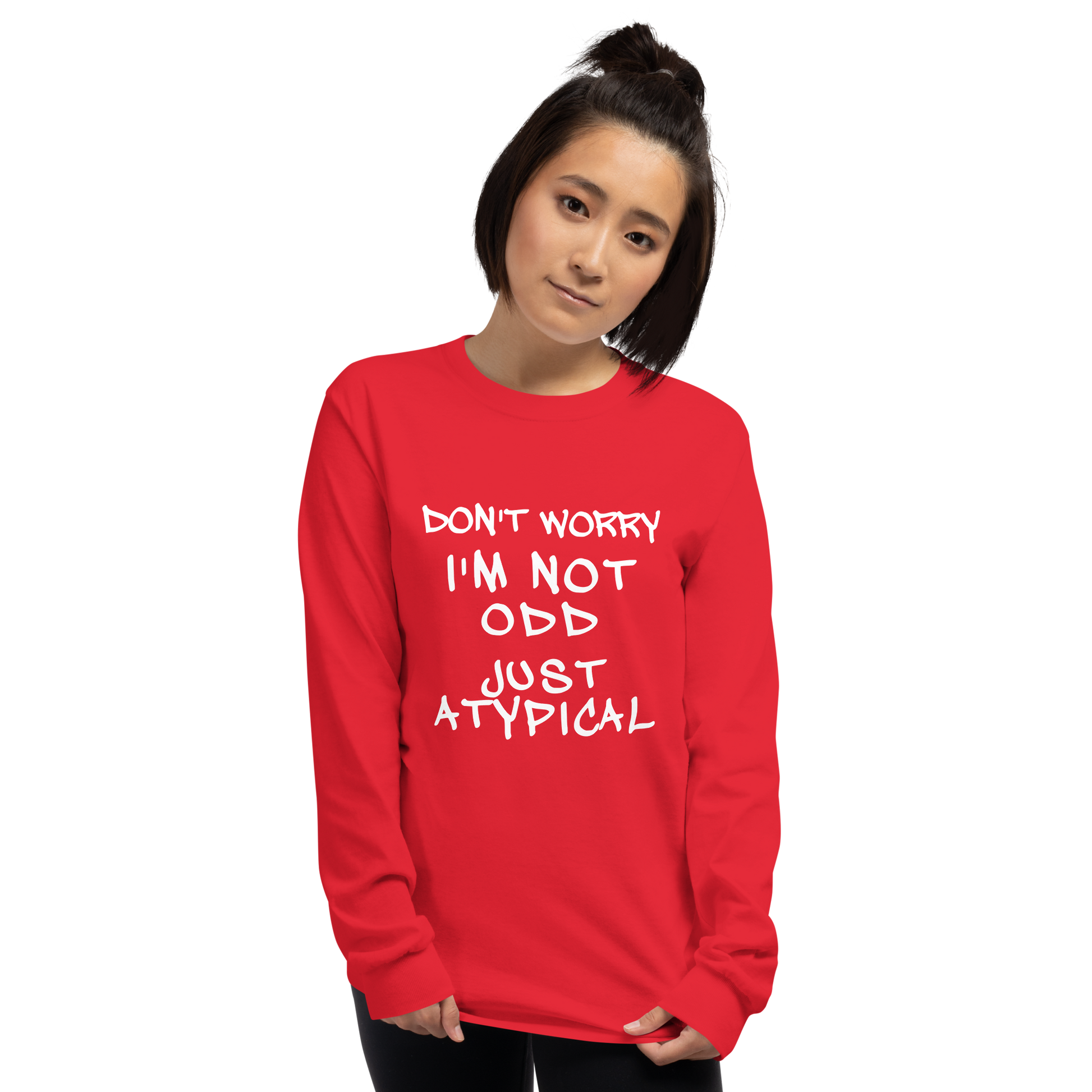 "Don't Worry I'm Not Odd Just Atypical" printed on a red men's long sleeve shirt worn by a female