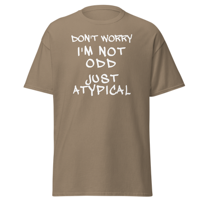 "Don't Worry I'm Not Odd Just Atypical" printed on a brown savana on an invisible body