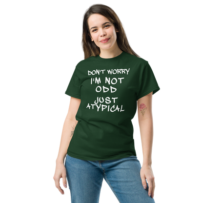 "Don't Worry I'm Not Odd Just Atypical" printed on a forest green unisex classic tee worn by a female