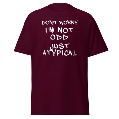 "Don't Worry I'm Not Odd Just Atypical" printed on a maroon on an invisible body