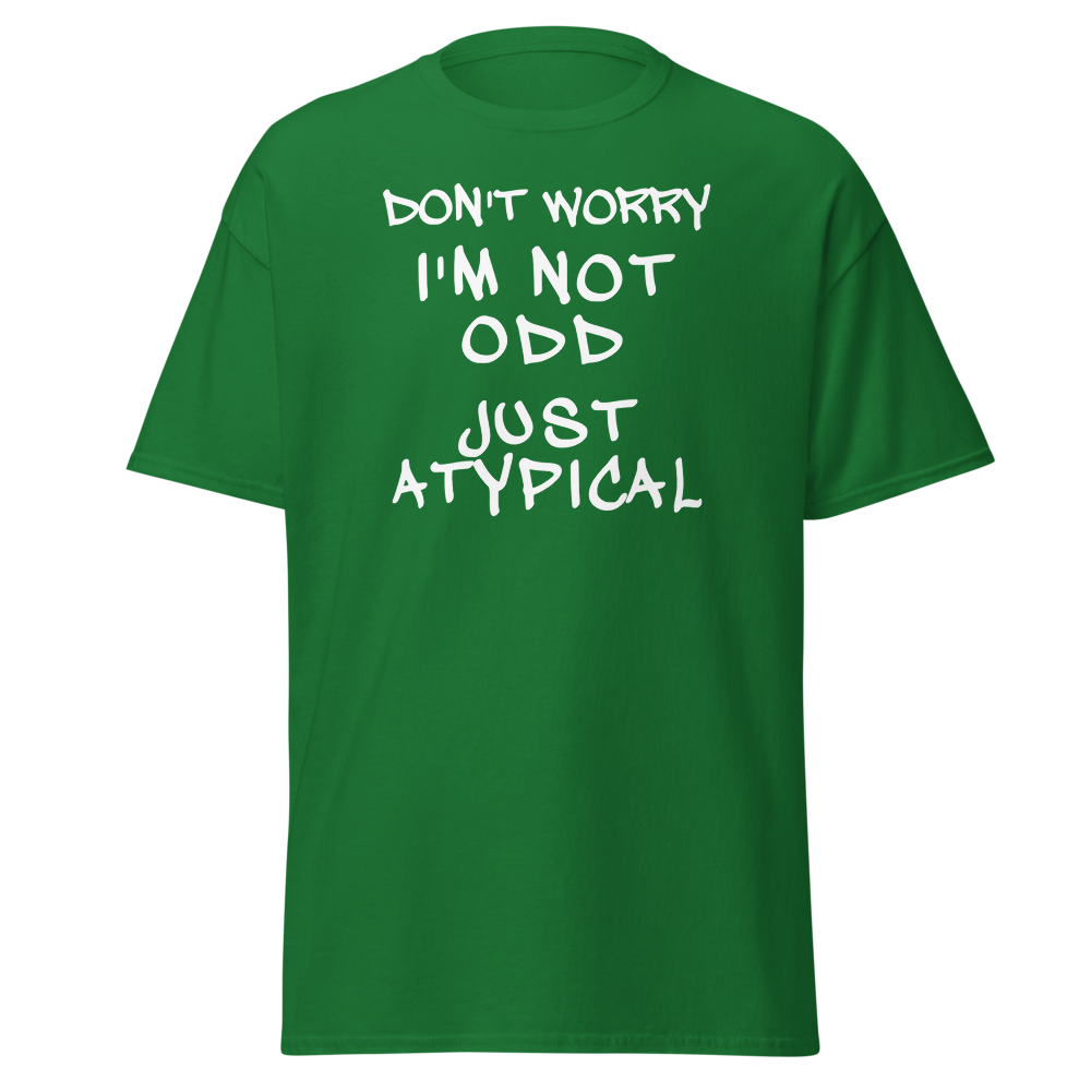 "Don't Worry I'm Not Odd Just Atypical" printed on a turf green on an invisible body