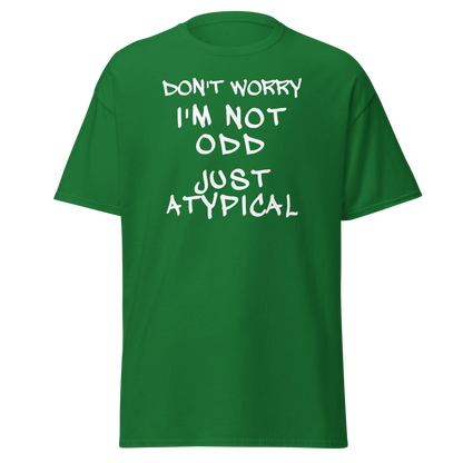 "Don't Worry I'm Not Odd Just Atypical" printed on a turf green on an invisible body