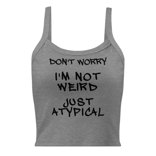 "Don't Worry I'm Not Weird Just Atypical" printed on a athletic heather women's micro-rib tanktop laying on a flat surface