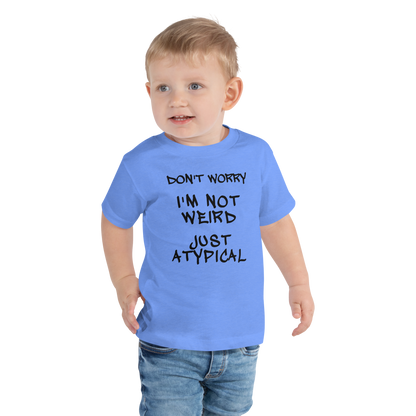 "Don't Worry I'm Not Weird Just Atypical" printed on a heather columbia blue toddler short sleeve tee worn by a male