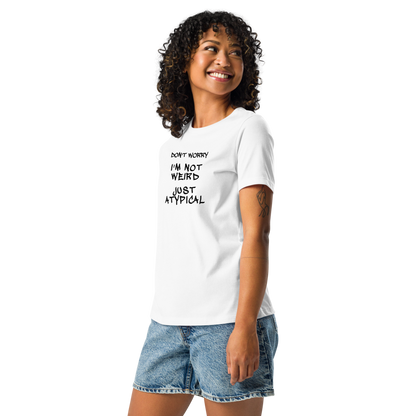 "Don't Worry I'm Not Weird Just Atypical" printed on a white women's relaxed t-shirt worn by a female