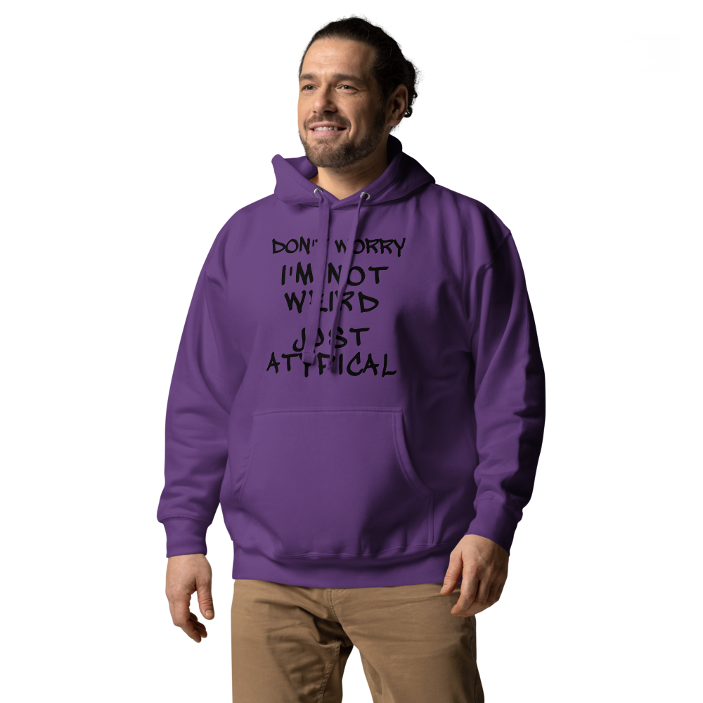 "Don't Worry I'm Not Weird Just Atypical" printed on a purple unisex hoodie worn by a male