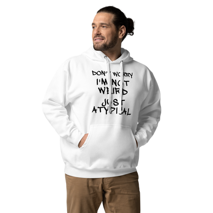 "Don't Worry I'm Not Weird Just Atypical" printed on a white unisex hoodie worn by a male