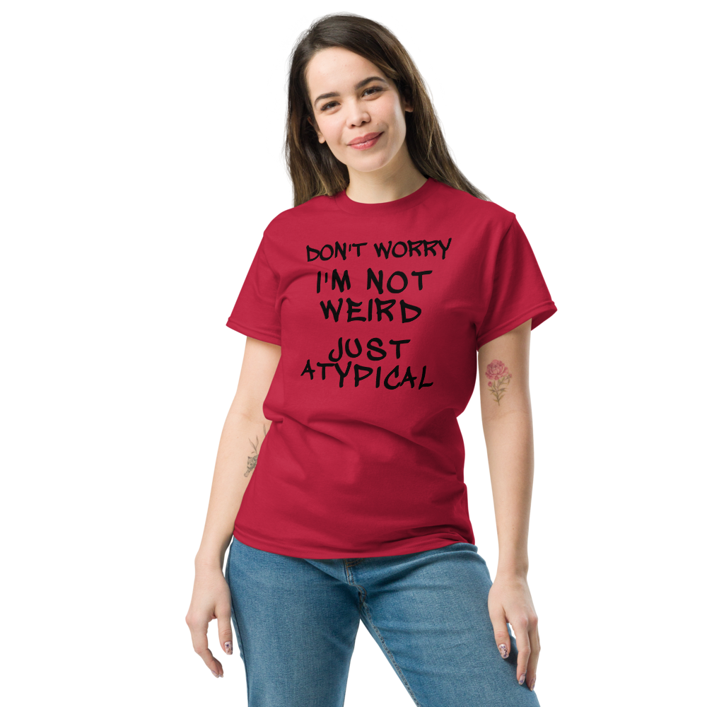 "Don't Worry I'm Not Weird Just Atypical" printed on a cardinal unisex classic tee worn by a female