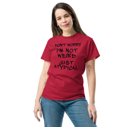 "Don't Worry I'm Not Weird Just Atypical" printed on a cardinal unisex classic tee worn by a female