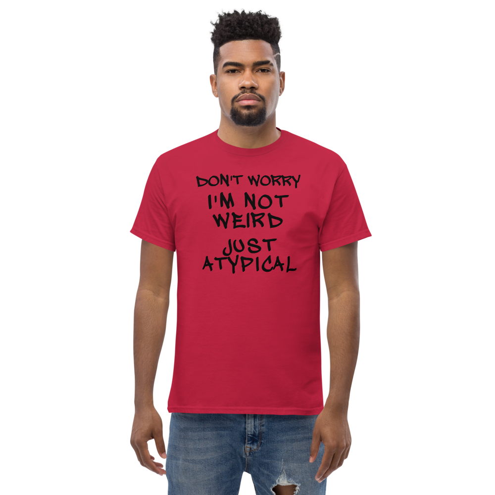 "Don't Worry I'm Not Weird Just Atypical" printed on a cardinal unisex classic tee worn by a male