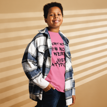 "Don't Worry I'm Not Weird Just Atypical" printed on a azalea youth classic tee worn by a male also wearing a jacket