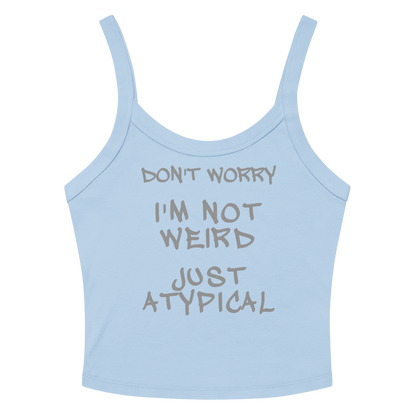 "Don't Worry I'm Not Weird Just Atypical" printed on a solid baby blue blend women's micro-rib tanktop laying on a flat surface amongst sunglasses and shorts