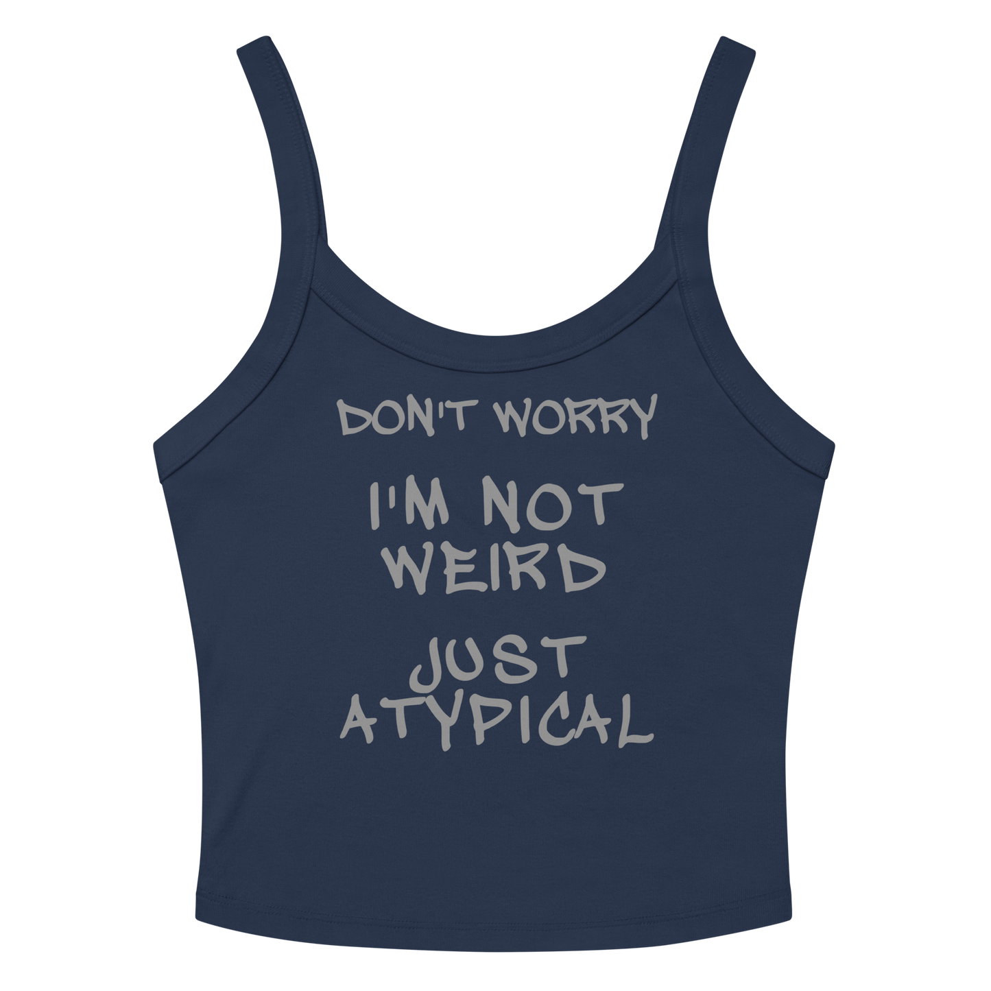 "Don't Worry I'm Not Weird Just Atypical" printed on a solid navy blend women's micro-rib tanktop laying on a flat surface amongst sunglasses and shorts