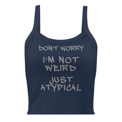 "Don't Worry I'm Not Weird Just Atypical" printed on a solid navy blend women's micro-rib tanktop laying on a flat surface
