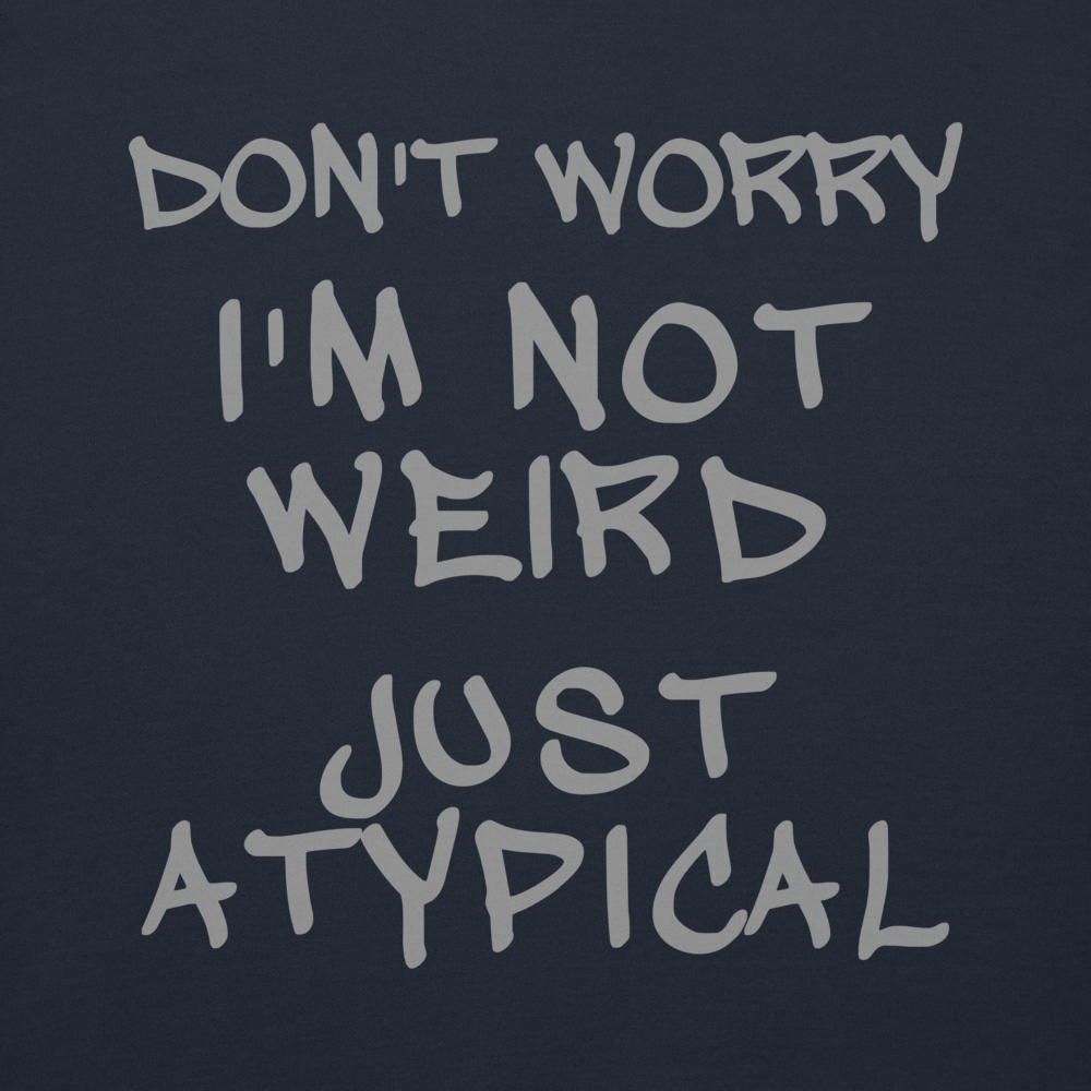 "Don't Worry I'm Not Weird Just Atypical" printed on a navy blazer background