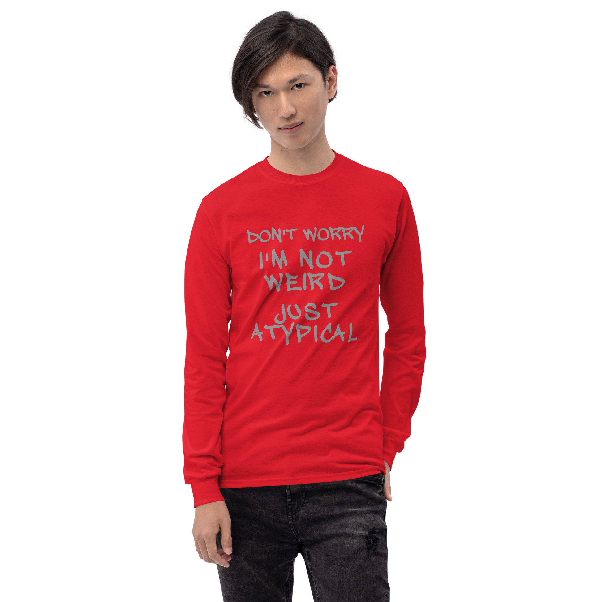 "Don't Worry I'm Not Weird Just Atypical" printed on a red men's long sleeve shirt worn by a male