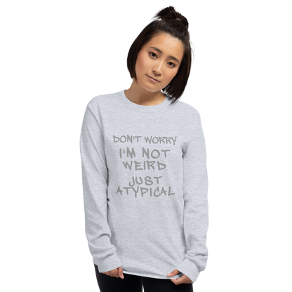 "Don't Worry I'm Not Weird Just Atypical" printed on a sport grey men's long sleeve shirt worn by a female